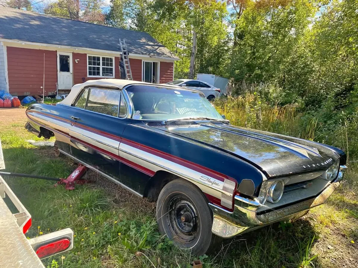 1961 Olds Starfire Convertible — photo 1